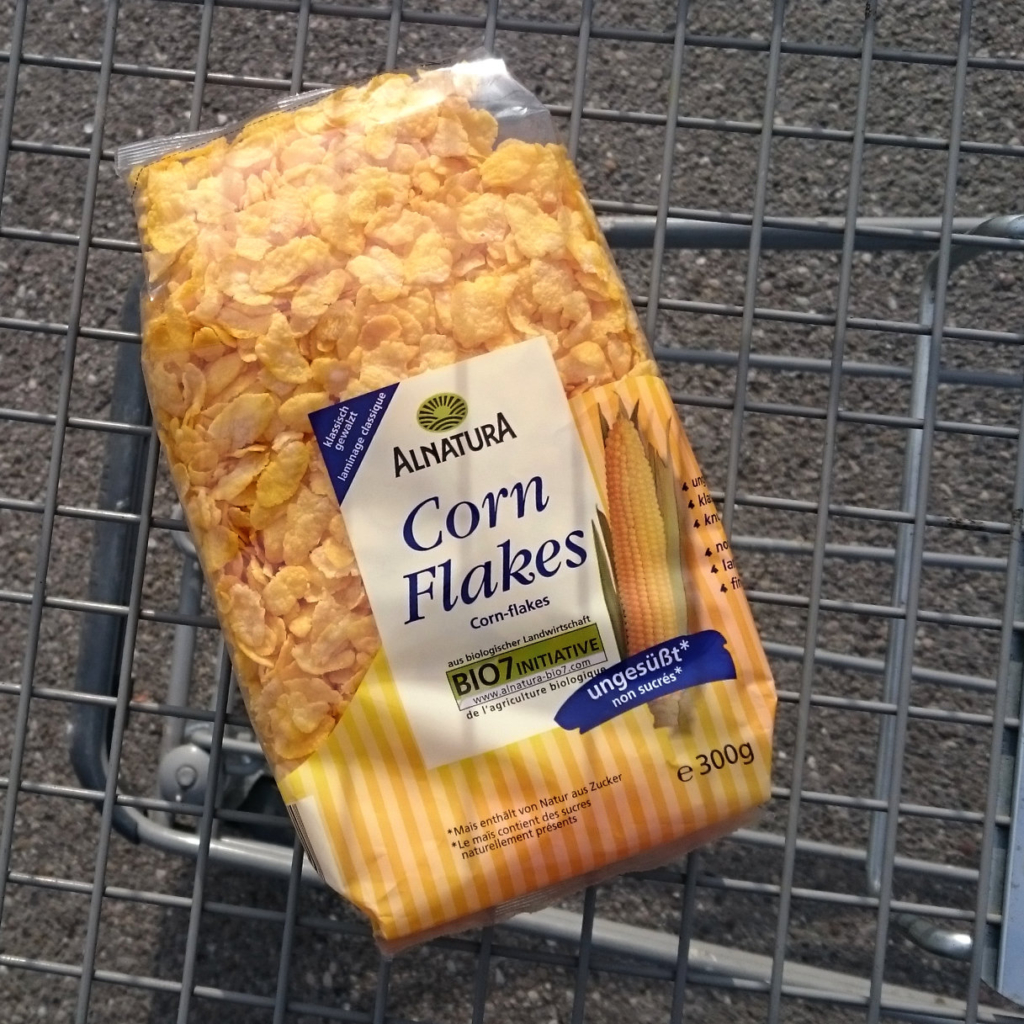 Shopping a pack of cornflakes.