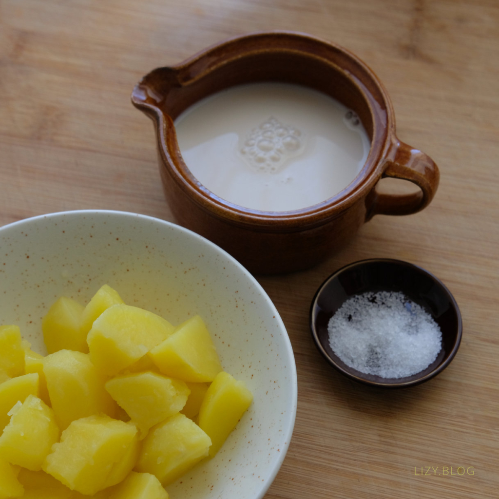 Freshly steamed potatoes with almond-milk.