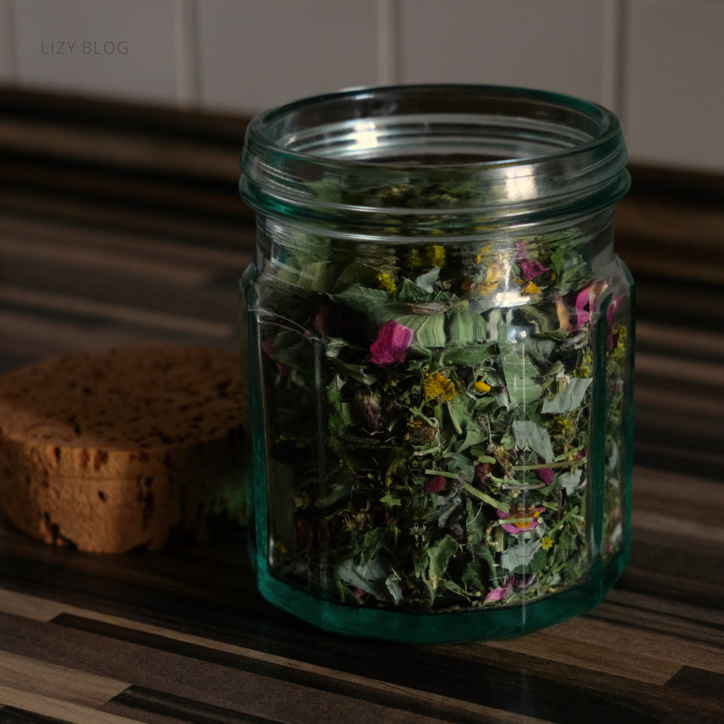 Selfmade herbal tea in a jar.