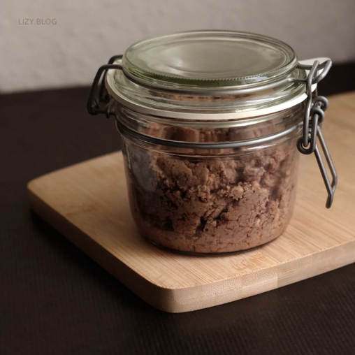 Vegan pate in a glass container.