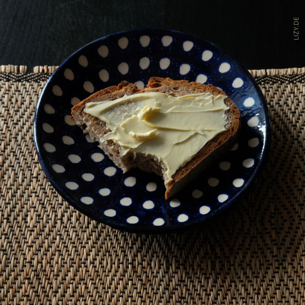 Vegan spread on a slice of rye bread.